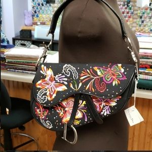 Saddle Bag it says Christian Dior